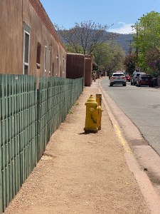 image of a fire hydrant blocking a sidewalk