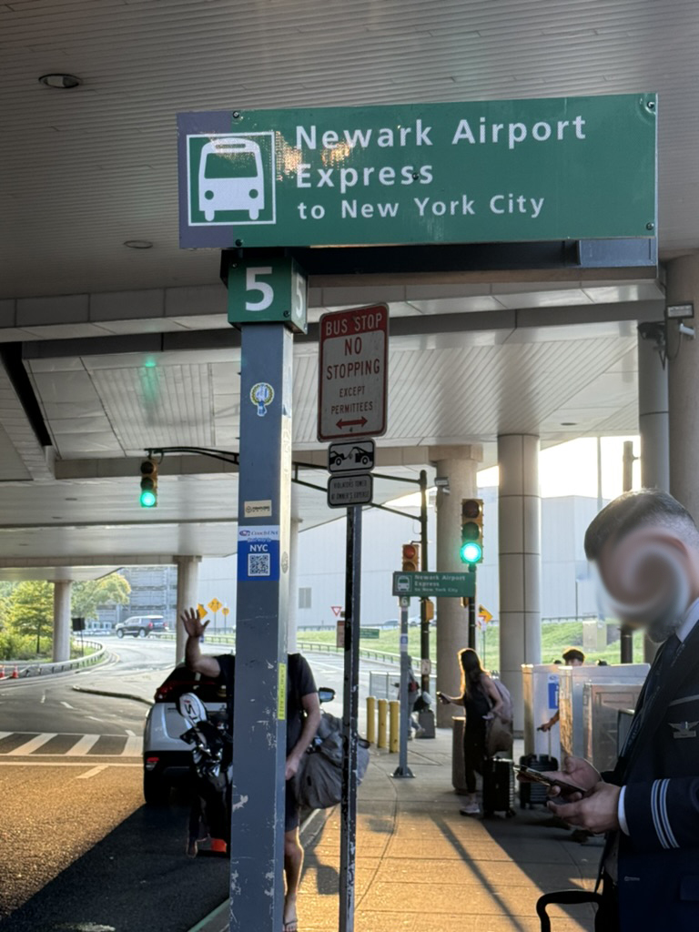 a picture of the bus sign for Newark Airport Express to NYC