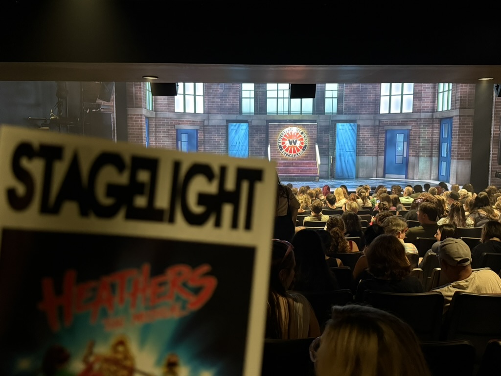A picture of the theatre from the seat for Heathers with Playbill.